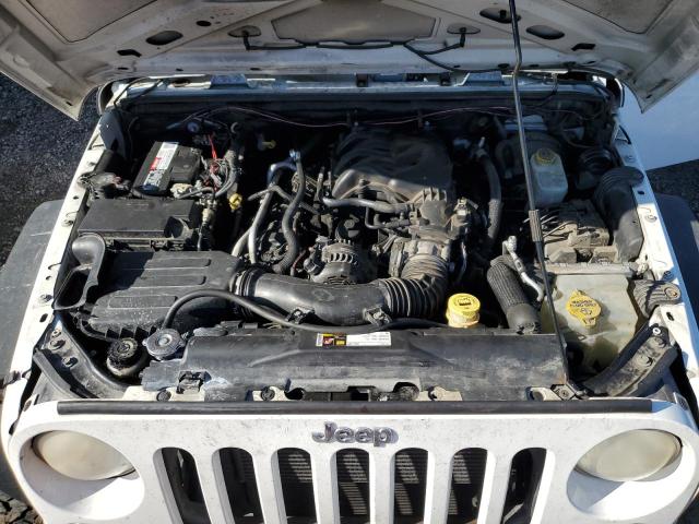 Photo 11 from auction – 2014 JEEP WRANGLER U with VIN 1C4BJWDG0EL257844