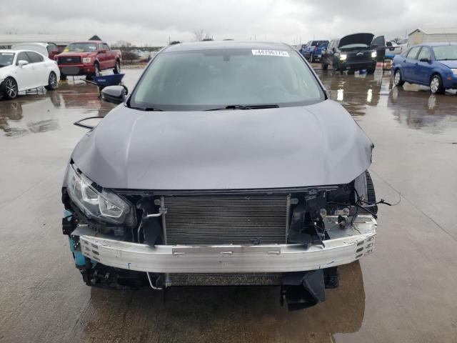 Photo 5 from auction – 2018 HONDA CIVIC EX with VIN 19XFC2F74JE014591