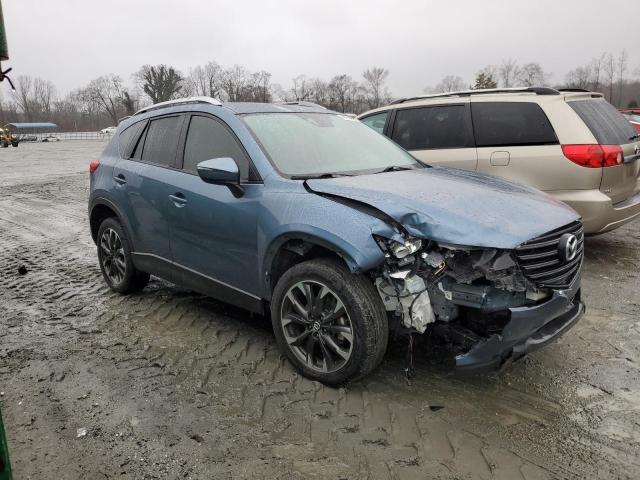 Photo 4 from auction – 2016 MAZDA CX-5 GT with VIN JM3KE4DY3G0893915