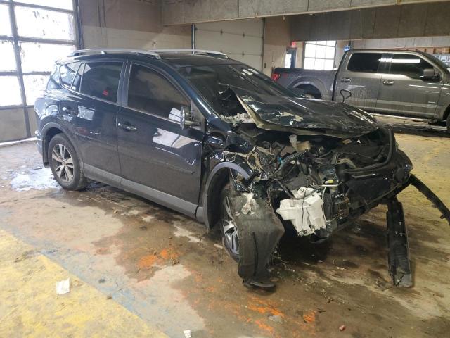 Photo 4 from auction – 2017 TOYOTA RAV4 XLE with VIN JTMRFREV5HD201878