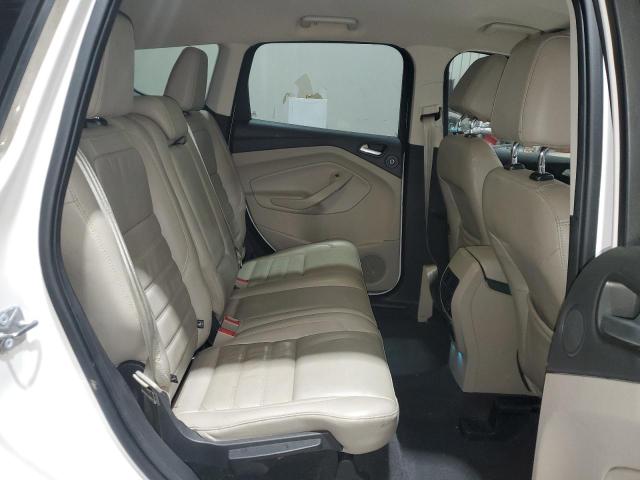 Photo 11 from auction – 2017 FORD ESCAPE TIT with VIN 1FMCU9J96HUA31532