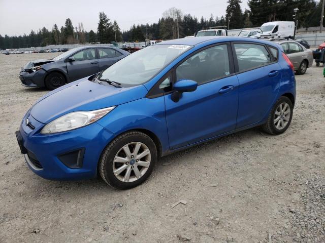 FORD FIESTA SE 2011 with VIN 3FADP4EJ9BM229143 - Photo from auction