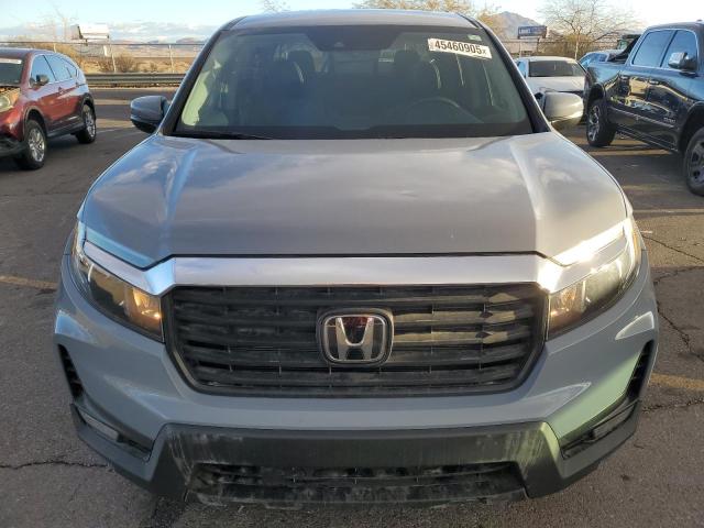 Photo 5 from auction – 2023 HONDA RIDGELINE with VIN 5FPYK3F54PB056592