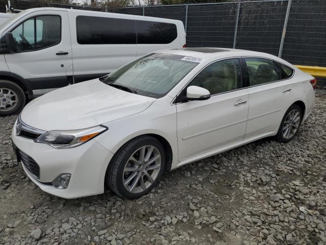 TOYOTA AVALON BAS 2014 with VIN 4T1BK1EB8EU103021 - Photo from auction