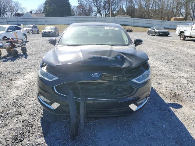 Photo 5 from auction – 2018 FORD FUSION TIT with VIN 3FA6P0D93JR234011