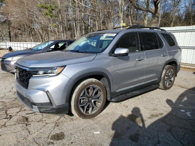 HONDA PILOT ELIT 2023 with VIN 5FNYG1H88PB014500 - Photo from auction