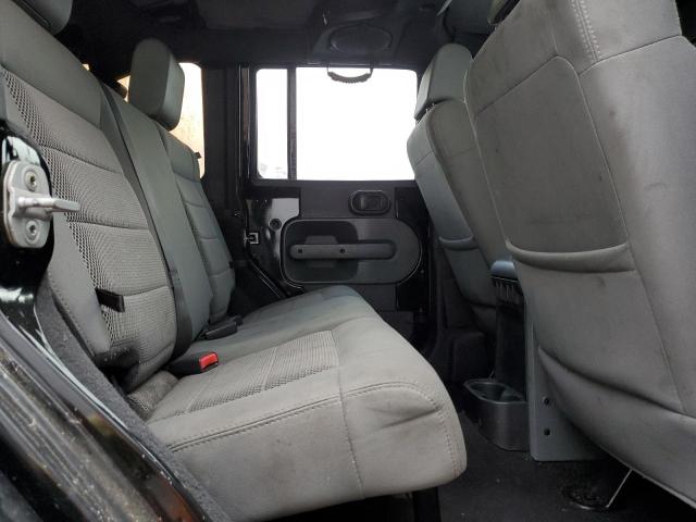 Photo 11 from auction – 2009 JEEP WRANGLER U with VIN 1J4GB59109L746195