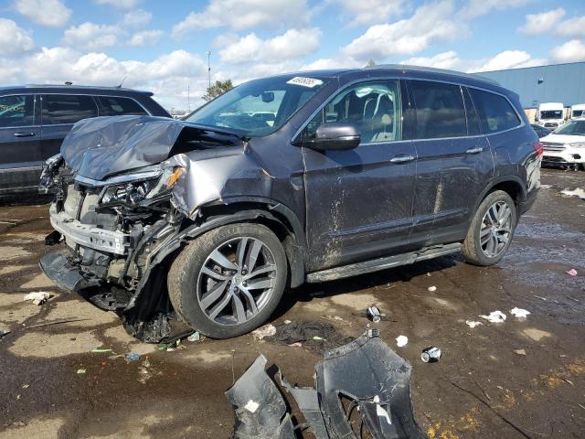 HONDA PILOT ELIT 2017 with VIN 5FNYF6H06HB067790 - Photo from auction