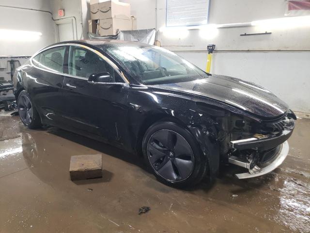 Photo 4 from auction – 2019 TESLA MODEL 3 with VIN 5YJ3E1EBXKF193521