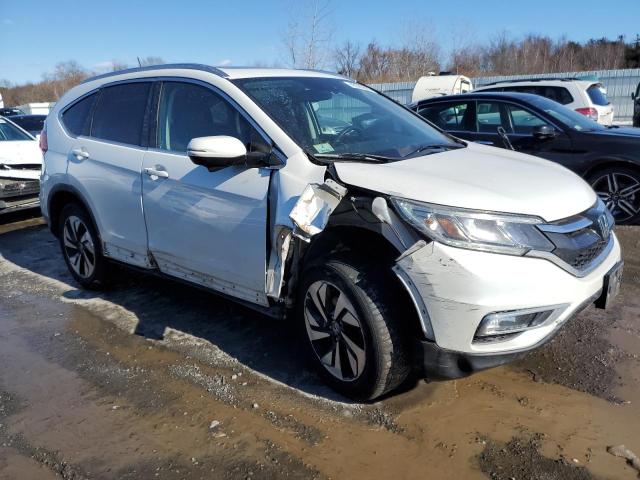 Photo 4 from auction – 2015 HONDA CR-V TOURI with VIN 5J6RM3H92FL021613