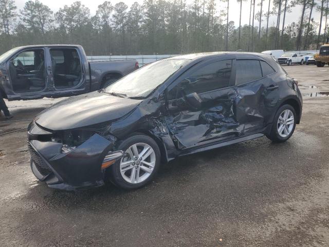 TOYOTA COROLLA SE 2019 with VIN JTNK4RBE6K3069332 - Photo from auction