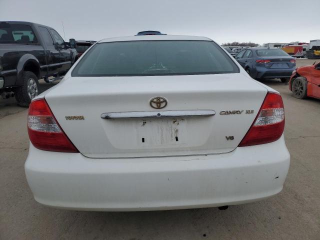 Photo 6 from auction – 2002 TOYOTA CAMRY with VIN JTDBF30K920023046