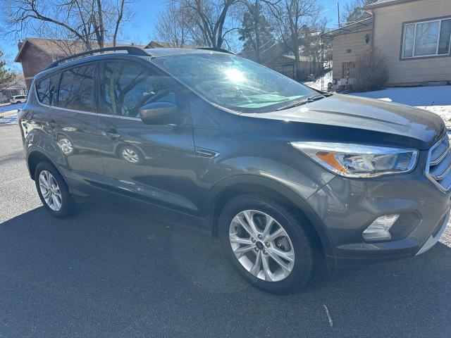 FORD ESCAPE SE 2018 with VIN 1FMCU9GD3JUC88813 - Photo from auction