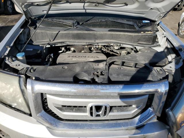 Photo 11 from auction – 2009 HONDA PILOT TOUR with VIN 5FNYF489X9B044470