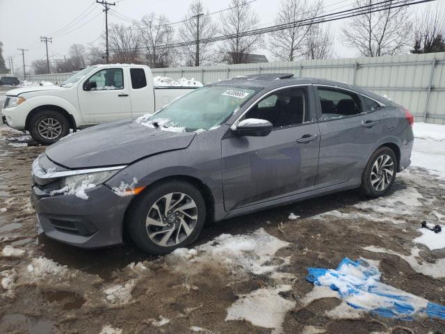 HONDA CIVIC EX 2018 with VIN 2HGFC2F75JH592625 - Photo from auction