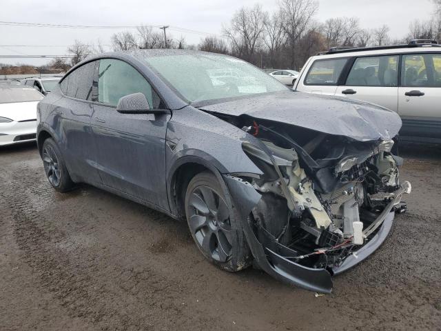 Снимка 4 от търг – 2023 TESLA MODEL Y с VIN 7SAYGDEE1PF684209