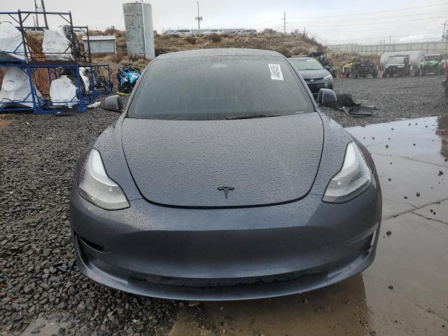 Photo 5 from auction – 2022 TESLA MODEL 3 with VIN 5YJ3E1EB3NF299331