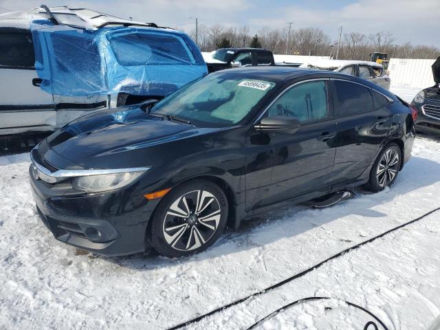 HONDA CIVIC EXL 2017 with VIN 19XFC1F77HE014671 - Photo from auction