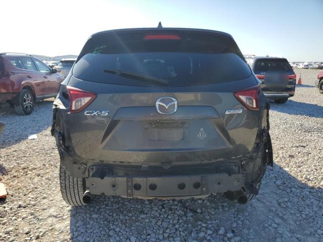 Photo 6 from auction – 2014 MAZDA CX-5 TOURI with VIN JM3KE2CYXE0364805