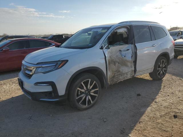 HONDA PILOT TOUR 2020 with VIN 5FNYF5H90LB019266 - Photo from auction