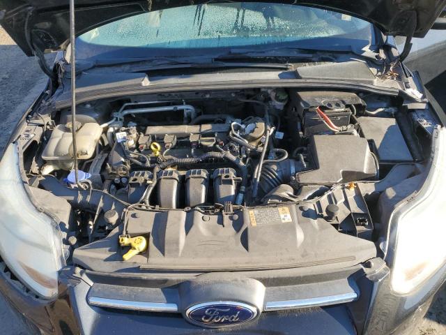 Photo 11 from auction – 2014 FORD FOCUS SE with VIN 1FADP3F22EL351009
