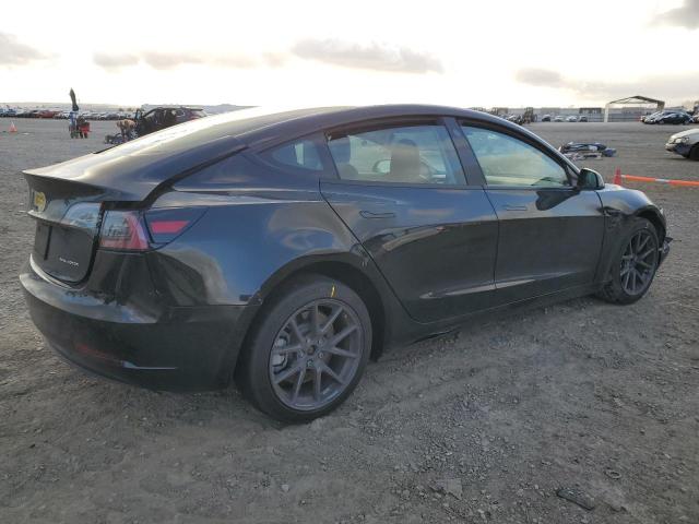 Photo 3 from auction – 2022 TESLA MODEL 3 with VIN 5YJ3E1EB4NF349315