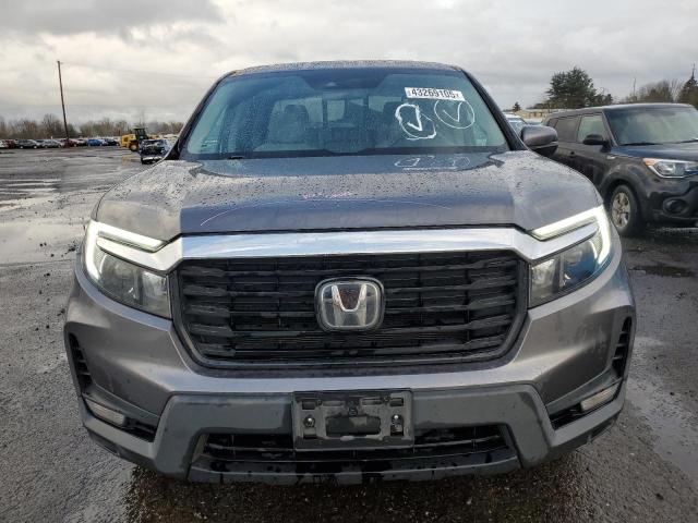 Photo 5 from auction – 2021 HONDA RIDGELINE with VIN 5FPYK3F74MB015036