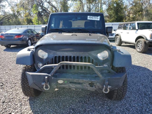 Photo 5 from auction – 2014 JEEP WRANGLER U with VIN 1C4BJWFG6EL322709