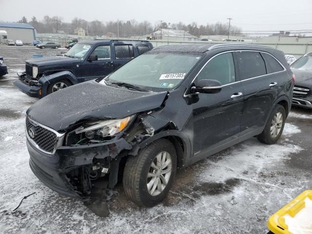 KIA SORENTO LX 2016 with VIN 5XYPGDA3XGG028841 - Photo from auction