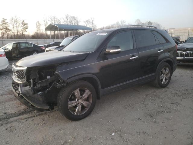 KIA SORENTO EX 2012 with VIN 5XYKU4A25CG187836 - Photo from auction