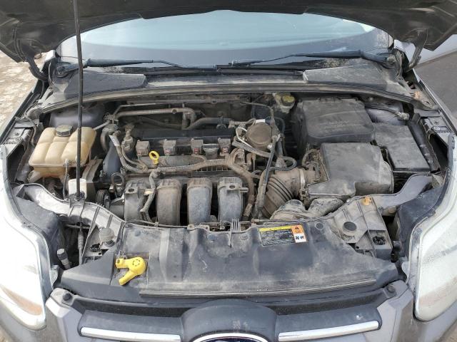 Photo 11 from auction – 2014 FORD FOCUS SE with VIN 1FADP3F24EL265300