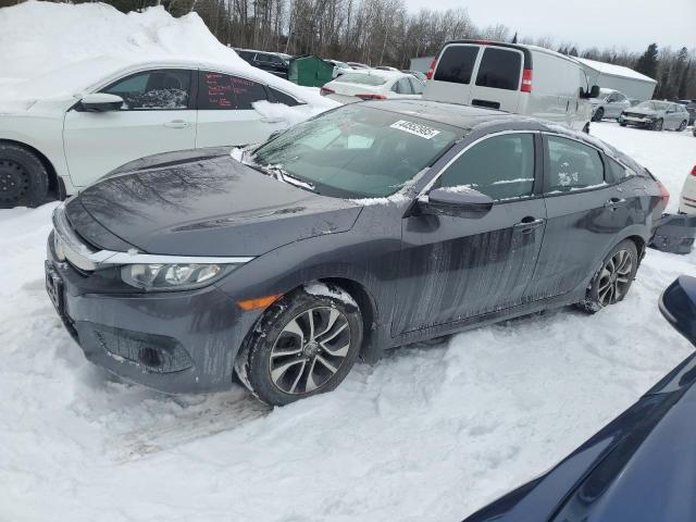 HONDA CIVIC EX 2017 with VIN 2HGFC2F85HH037581 - Photo from auction