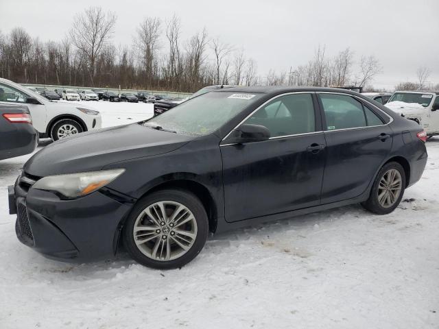 TOYOTA CAMRY LE 2017 with VIN 4T1BF1FK3HU703260 - Photo from auction