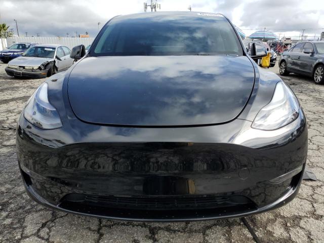 Photo 5 from auction – 2023 TESLA MODEL Y with VIN 7SAYGDEF5PF959959