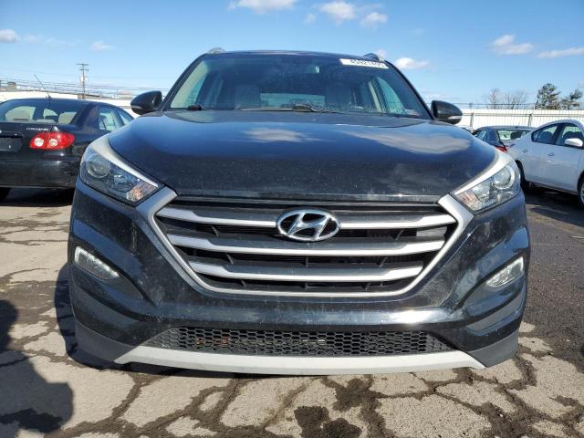 Photo 5 from auction – 2017 HYUNDAI TUCSON LIM with VIN KM8J3CA26HU298485