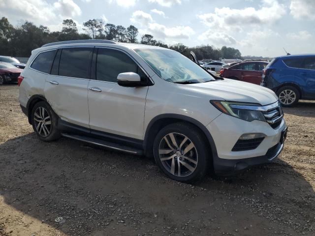 Photo 4 from auction – 2016 HONDA PILOT ELIT with VIN 5FNYF6H05GB043169