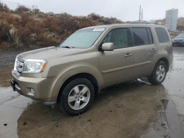HONDA PILOT EXL 2011 with VIN 5FNYF4H54BB001990 - Photo from auction