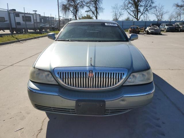 Photo 5 from auction – 2004 LINCOLN TOWN CAR E with VIN 1LNHM81W14Y667848