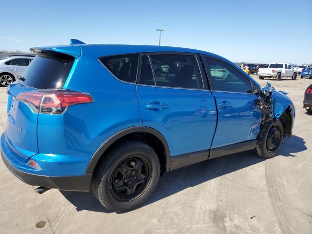Photo 3 from auction – 2018 TOYOTA RAV4 LE with VIN 2T3ZFREV7JW432614