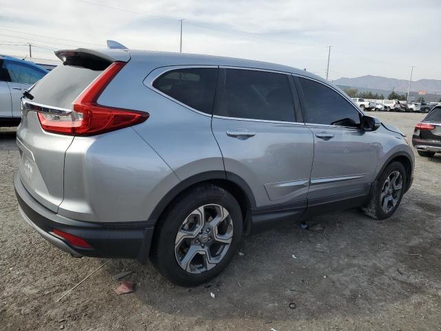 Photo 3 from auction – 2018 HONDA CR-V EX with VIN 5J6RW1H50JA012750