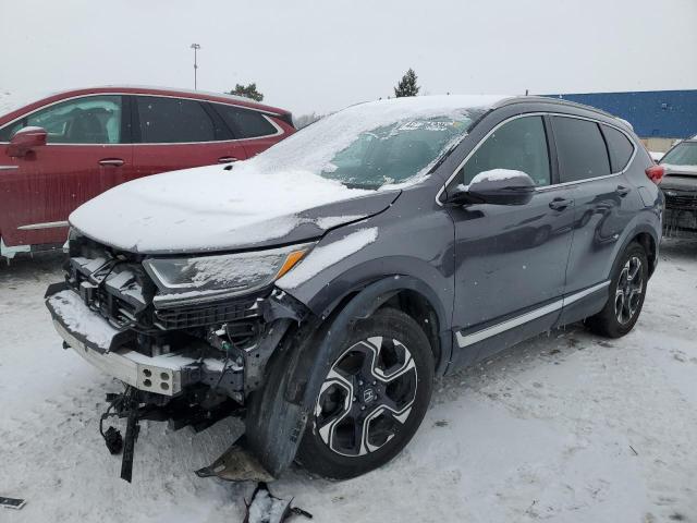 HONDA CR-V TOURI 2018 with VIN 7FARW2H92JE025591 - Photo from auction