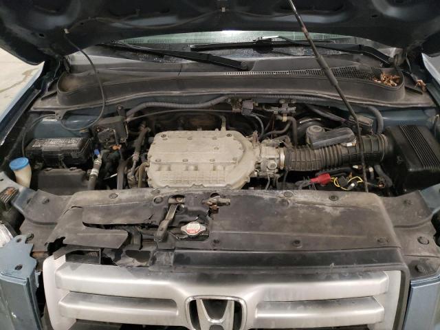 Photo 12 from auction – 2006 HONDA PILOT EX with VIN 2HKYF18676H554339