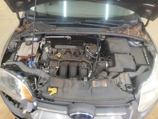 Photo 11 from auction – 2014 FORD FOCUS SE with VIN 1FADP3K29EL435737