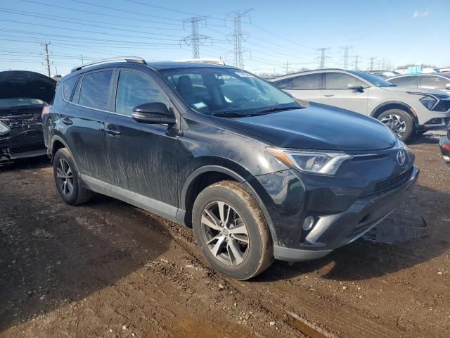 Photo 4 from auction – 2016 TOYOTA RAV4 XLE with VIN 2T3RFREV6GW419913