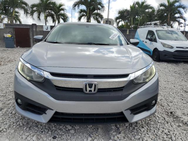 Photo 5 from auction – 2016 HONDA CIVIC EX with VIN 19XFC1F35GE038110
