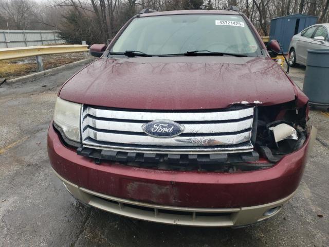 Photo 5 from auction – 2008 FORD TAURUS X E with VIN 1FMDK08W68GA26217