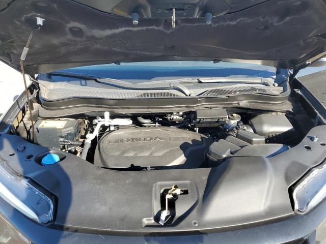 Photo 12 from auction – 2021 HONDA PASSPORT E with VIN 5FNYF8H54MB038483