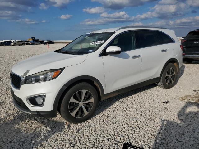 KIA SORENTO EX 2016 with VIN 5XYPH4A18GG047299 - Photo from auction