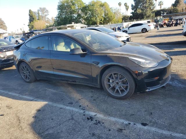 Photo 4 from auction – 2021 TESLA MODEL 3 with VIN 5YJ3E1EA5MF074558