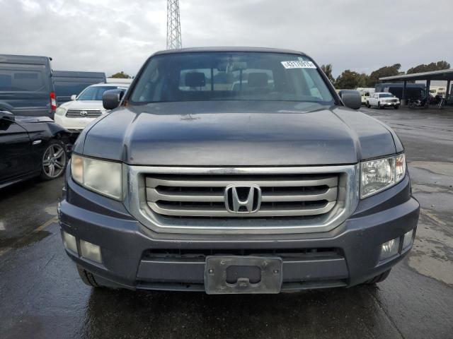 Photo 5 from auction – 2013 HONDA RIDGELINE with VIN 5FPYK1F5XDB009227